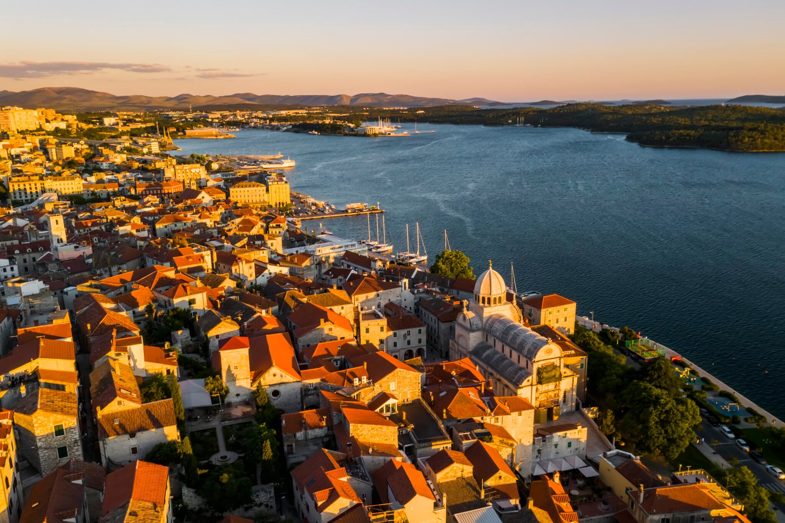 Beautiful old city of Sibenik, aerial view of the town center at sunset. Croatia