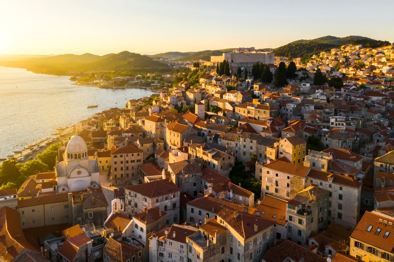 Beautiful old city of Sibenik, aerial view of the town center at sunset. Croatia