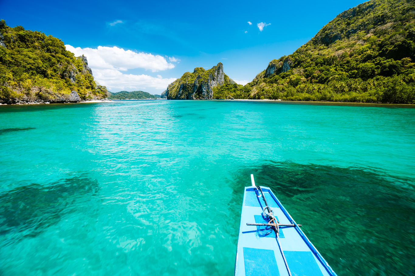 Trip tourist boat in blue shallow water lagoon. Discover exploring unique nature, journey to paradise approaching tropical island.